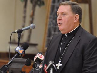 Cardinal-designate Joseph W. Tobin of Indianapolis speaks at an Oct. 10 news conference at the Archbishop Edward T. O'Meara Catholic Center in Indianapolis about being named a cardinal by Pope Francis the day before. (CNS photo/Sean Gallagher, The Criterion) See US-CARDINALS-TOBIN Oct. 10, 2016.