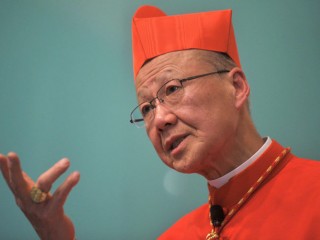 Hong Kong's Cardinal John Tong gestures as he speaks during a press conference in Hong Kong on March 2, 2012. Having been appointed by Pope Benedict XVI in February, Cardinal Tong held his first press conference in Hong Kong saying that he was optimistic that China will be more open on religious freedom. AFP PHOTO / AARON TAM (Photo credit should read aaron tam/AFP/Getty Images)