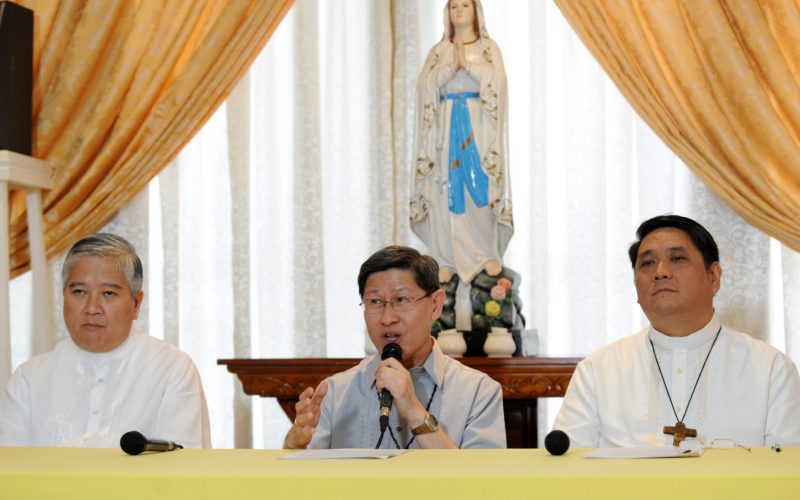Senior Filipino Roman Catholic bishops Socrates Villegas (L), Luis Tagle (C) and Mylo Vergara (R) attend a press conference in Manila on July 7, 2014. Pope Francis is to visit the Philippines, Asia's bastion of the Catholic faith, in January 2015 to comfort victims of disasters such as Super Typhoon Haiyan, local church leaders said on July 7. AFP PHOTO / Jay DIRECTO (Photo credit should read JAY DIRECTO/AFP/Getty Images)