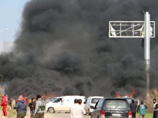A picture taken on April 15, 2017, shows smoke billowing following a suicide car bombing in Rashidin, west of Aleppo, that targeted buses carrying Syrians evacuated from two besieged government-held towns of Fuaa and Kafraya.
At least 40 people were killed in a suicide car bombing near buses carrying Syrians evacuated from two besieged government-held towns, the Syrian Observatory for Human Rights said.
/ AFP PHOTO / Ibrahim YASOUF        (Photo credit should read IBRAHIM YASOUF/AFP/Getty Images)