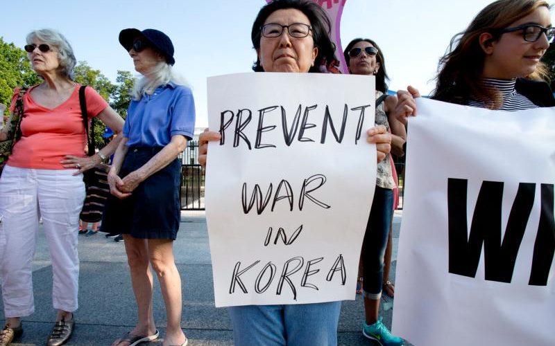 Nuclear war protesters demonstrate outside the White House in Washington Aug. 9. Church officials called for dialogue to ease U.S.-North Korea tensions. (CNS photo/Tyler Orsburn) See US-KOREA-TOMASI and US-KOREA-DIPLOMACY Aug. 10, 2017.