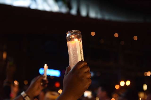 Vigil_racism_candle_Credit_a_katz_Shutterstock_CNA