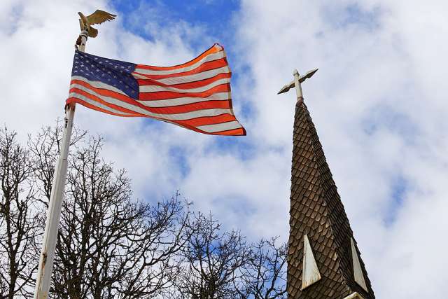 American_flag_and_Church_Credit_Bobkeenan_Photography_via_wwwshutterstockcom_CNA_3_1_16