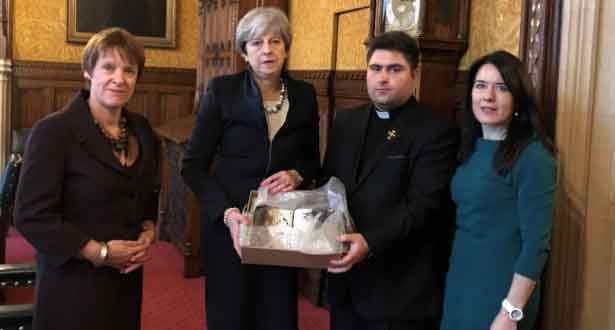 Bible-burnt-by-Islamic-State-is-Presented-to-Prime-Minister-Theresa-May