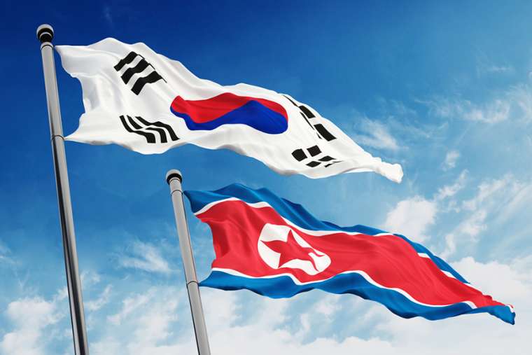 North_and_South_Korea_flags_Credit_cigdem_Shutterstock_CNA