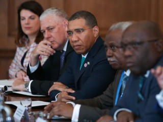 LONDON, ENGLAND - APRIL 17: Prime Minister of Jamaica Andrew Holness (C) attends a meeting with leaders and representatives of Caribbean countries at 10 Downing Street on April 17, 2017 in London, England. Theresa May is meeting Caribbean leaders as the Government faces severe criticism over the treatment of the "Windrush" generation of British residents.  (Photo by Daniel Leal-Olivas - WPA Pool/Getty Images)