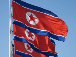 Flags_of_the_Democratic_Peoples_Republic_of_Korea_flies_in_Pyongyang_Credit_John_Pavelka_via_Flickr_CC_BY_20_CNA_10_21_14