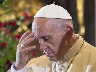 Pope_Francis_prays_at_the_Wawel_Cathedral_in_Krakow_Poland_on_July_27_2016_Credit_LOsservatore_Romano_CNA