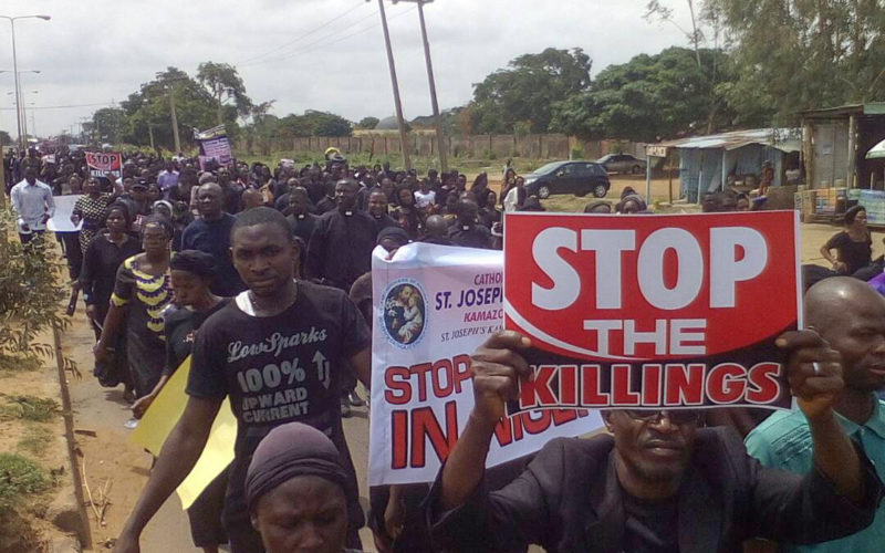 Nigeria, May 22th 2018 Christians demonstrating peaceful against the bloodshed in Nigeria - after the murder of Two Priests and their  Parishioners  During the  celebration  of the  Holy Mass, in Mbalom, Benue State on 24.04.2018