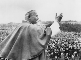 Pope John Paul II blesses the crowd in 1979 at the shrine of Our Lady of Knock in Ireland. Pope Francis will visit Dublin and Knock, Ireland, Aug. 25-26, mainly for the World Meeting of Families. But he also will meet Irish government leaders and is expected to meet with survivors of sexual abuse. (CNS file photo) See VATICAN-LETTER-FAMILIES-FARRELL July 26, 2018.