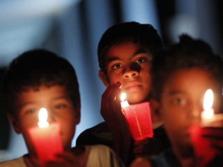 Young people keep vigil in front of Brazil's Supreme Court in an attempt to influence ministers to vote against the legalization of abortion in 2012 in Brasilia. Brazil's high court was considering decriminalizing abortion after hearings Aug. 3 and Aug 6. (CNS photo/Ueslei Marcelino, Reuters) See BRAZIL-ABORTION Aug. 6, 2018.