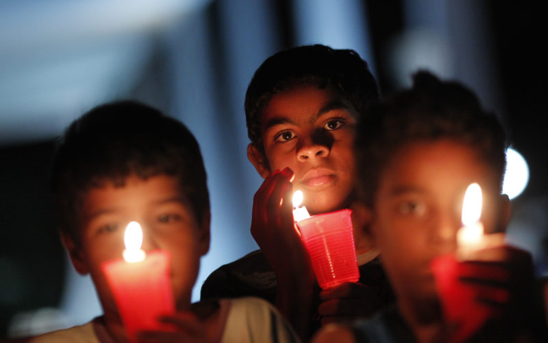 Young people keep vigil in front of Brazil's Supreme Court in an attempt to influence ministers to vote against the legalization of abortion in 2012 in Brasilia. Brazil's high court was considering decriminalizing abortion after hearings Aug. 3 and Aug 6. (CNS photo/Ueslei Marcelino, Reuters) See BRAZIL-ABORTION Aug. 6, 2018.