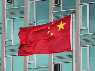 Flag_of_China_Credit_Tomas_Roggero_via_Flickr_CC_BY_20_CNA_11_15_13-690x450