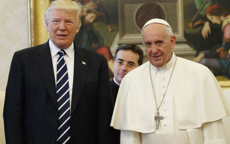 Pope Francis (R) stands with US President Donald Trump during a private audience at the Vatican on May 24, 2017. US President Donald Trump met Pope Francis at the Vatican today in a keenly-anticipated first face-to-face encounter between two world leaders who have clashed repeatedly on several issues. / AFP PHOTO / POOL / Evan Vucci (Photo credit should read EVAN VUCCI/AFP/Getty Images)