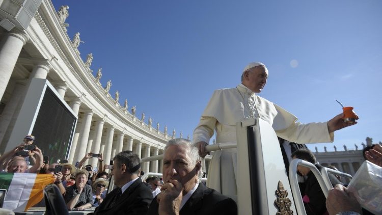 Pope Francis arrives in St. Peter's for the General Audience 14