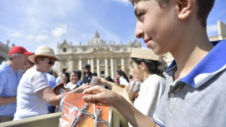 Pope Francis waves to the crowds at the Sunday Angelus 10