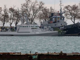 Seized_Ukrainian_military_vessels_are_seen_in_a_port_of_Kerch_Crimea_Nov_26_2018_Russian_forces_boarded_and_captured_the_ships_Sunday_Credit_STR_AFP_Getty_Images_CNA