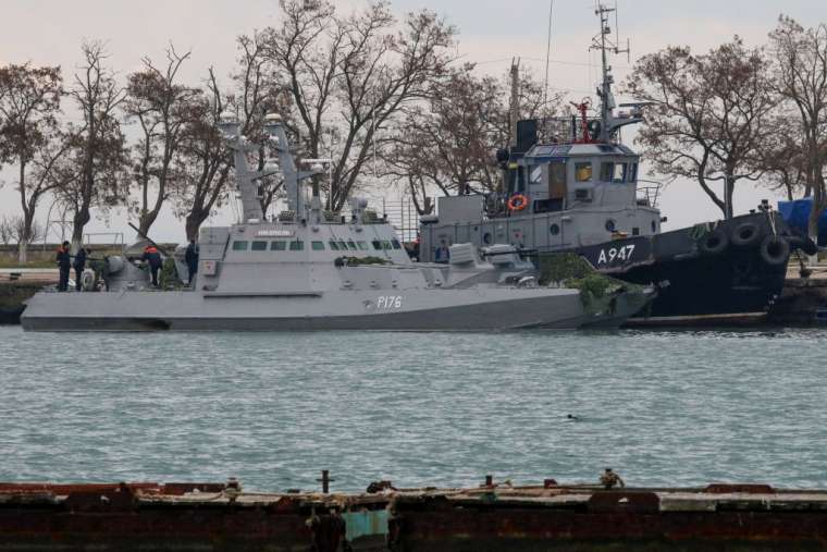 Seized_Ukrainian_military_vessels_are_seen_in_a_port_of_Kerch_Crimea_Nov_26_2018_Russian_forces_boarded_and_captured_the_ships_Sunday_Credit_STR_AFP_Getty_Images_CNA
