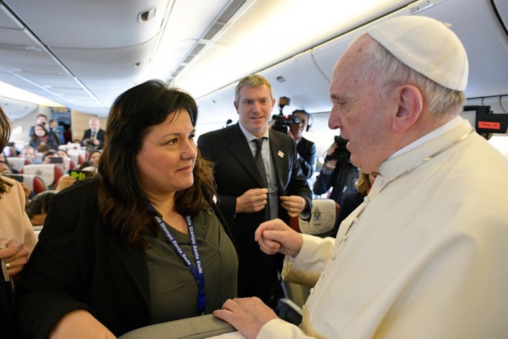 Silvina Perez, a journalist for the Vatican's L'Osservatore Romano newspaper, meets Pope Francis aboard his flight to Chile Jan. 15, 2018. The Vatican newspaper, L'Osservatore Romano, named Perez to the editorial staff of its women's magazine, "Women-Church-World." The naming of a new director and editorial board for the magazine comes a month after the former director and members of the editorial board abruptly resigned. (CNS photo/Vatican Media) See VATICAN-MEDIA-APPOINTMENTS April 30, 2019.