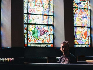 Young_man_church_Credit_Unsplash_CNA