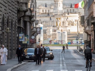 Pope Francis walks in a deserted Rome to pray at two shrines for the end of the coronavirus pandemic, in Rome