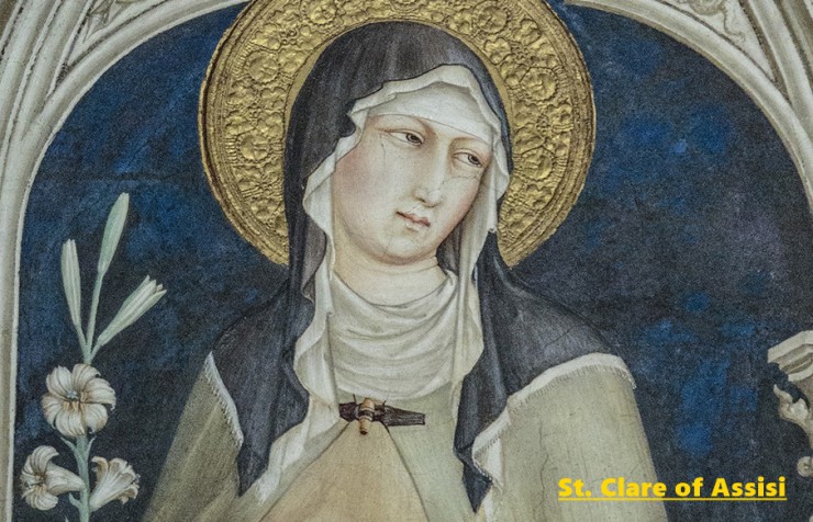 This mosaic in Assisi, Italy, photographed May 28, depicts St. Clare of Assisi holding a palm frond, a symbol of her entering religious life. She founded a religious order of women called the Poor Clares and is closely associated with St. Francis of Assisi. She maintained a life of poverty. Her feast day is Aug. 11. (CNS photo/Octavio Duran)