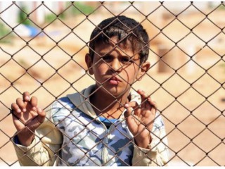 Một đứa trẻ tị nạn người Syria (Ảnh: Thomas Koch via Shutterstock)