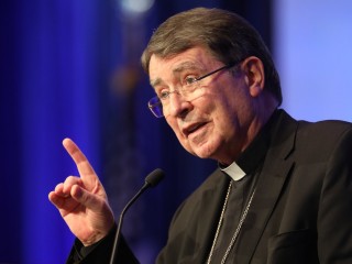 Archbishop Christophe Pierre, apostolic nuncio to the United States, speaks Nov. 16, 2021, during a session of the fall general assembly of the U.S. Conference of Catholic Bishops in Baltimore. Due to the COVID-19 pandemic, it is the first in-person bishops' meeting since 2019. (CNS photo/Bob Roller)