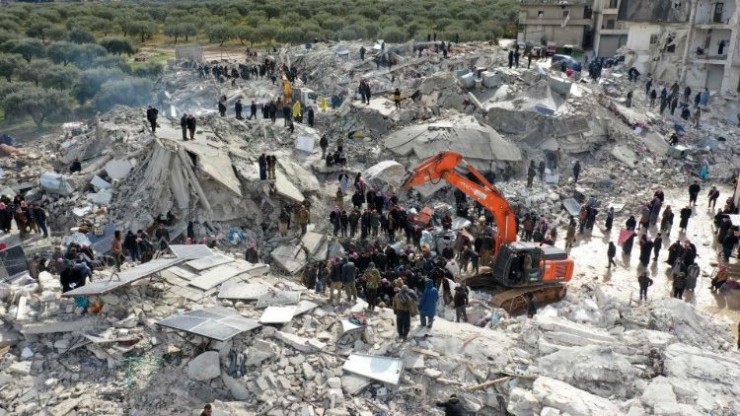 Hậu quả của trận động đất ở làng Besnia của Syria (Ảnh: AFP)