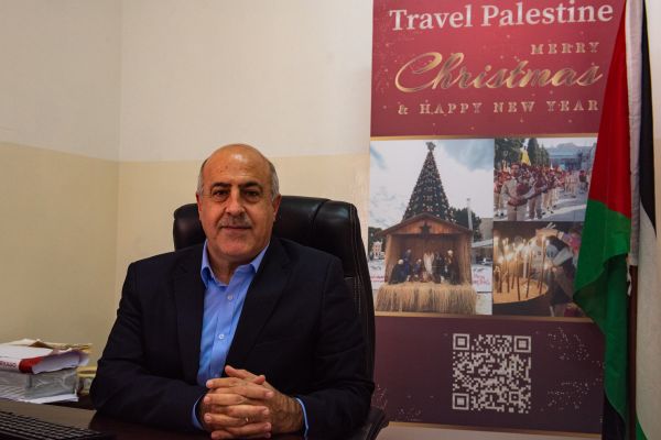 Majed Ishaq, Tổng giám đốc bộ phận tiếp thị của Bộ Du lịch và Cổ vật Palestine, tại văn phòng của ông ở Bethlehem, nơi CNA đã phỏng vấn ông vào Thứ Bảy, ngày 18 tháng 11 năm 2023 (Ảnh: Marinella Bandini)