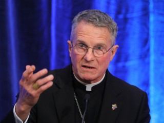 Archbishop Timothy P. Broglio of the U.S. Archdiocese for the Military Services, gestures during a Nov. 15, 2022, news conference after being elected president of the U.S. Conference of Catholic Bishops during the fall general assembly of the bishops in Baltimore. (CNS photo/Bob Roller)