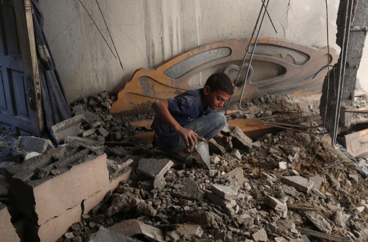 Khủng hoảng nhân đạo ở Gaza (Ảnh: MAHMOUD ISSA)